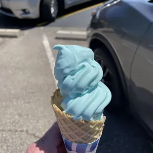 hand holding ice cream cone