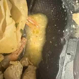 Excess juice at the bottom of my platter. I had to use a paper towel to soak it up as I was eating my meal.