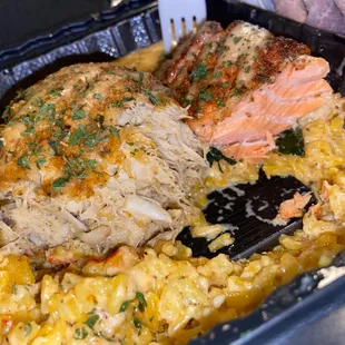 Crab cakes and salmon pasta over rice