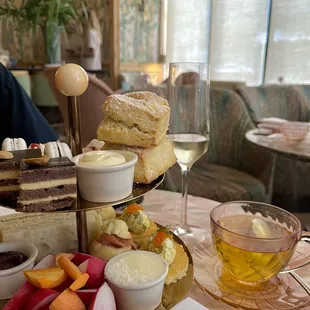 a plate of food and a glass of wine