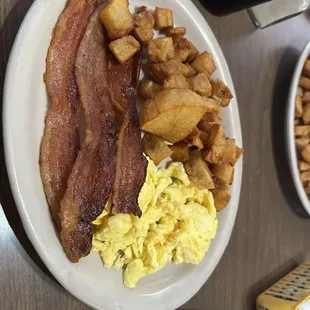 2eggs, bacon, home fries and toast