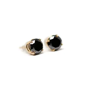 Black diamond stud earrings in 14k yellow gold basket settings.
