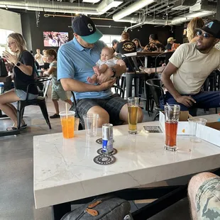 The lady with the foot up that likes to give people dirty looks for bringing their kids to a brewery