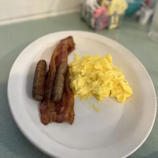 Eggs and bacon with sausage