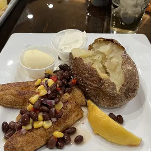 Lent fish fry. Baked fish with corn/bean salsa, baked potato.