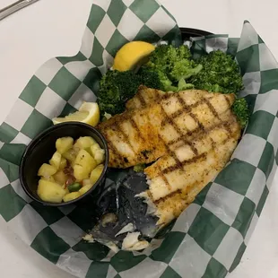 Broiled tilapia with steamed broccoli and pineapple salsa. This dinner was my favorite for $12.95.