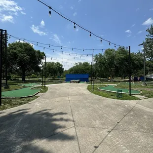 Mini golf entrance. Paved, accessible sidewalks.