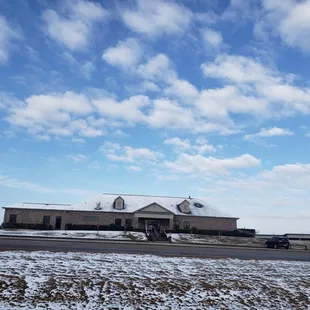a large building on a snowy day
