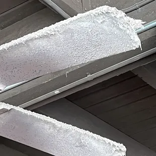 Nasty fans above ticket lines... it was so hot and it would be fantastic if they were clean and functional.