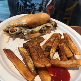 Philly cheesesteak and homecut fries