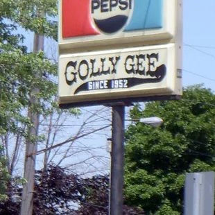 a pepsi sign on a pole