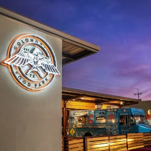 a food truck parked in front of a building