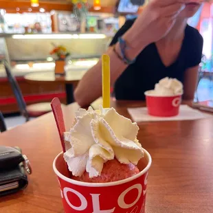 a woman sitting at a table