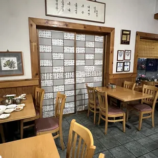 a restaurant with tables and chairs