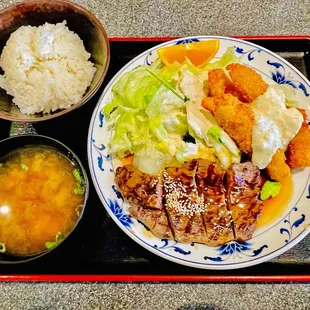 a plate of food on a tray