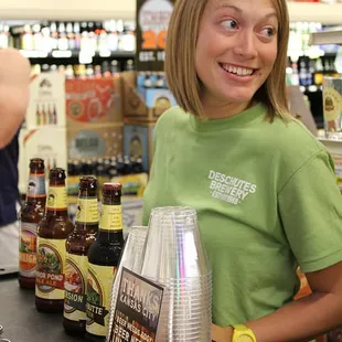 a woman behind the counter