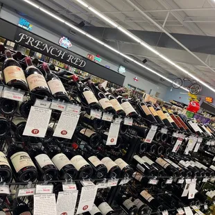 a large display of wine bottles