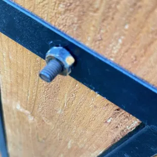 Rusted metal bolt about two weeks after install