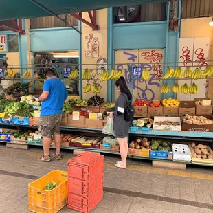 Fresh produce displayed in front of store
