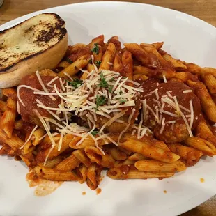 Meatballs and Marinara Sauce Over Penne