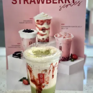 Matcha milk tea with strawberry syrup