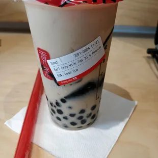 Earl grey milk tea with 3 J's
