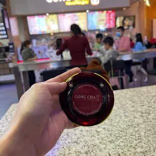 a person holding a glass of wine