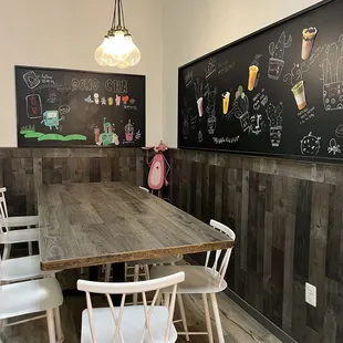 a table and chairs in a restaurant