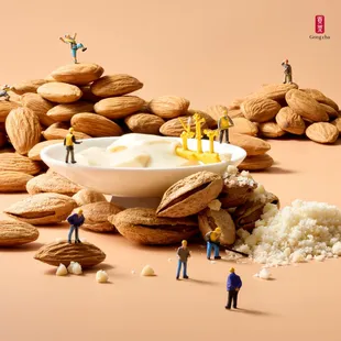 a bowl of almonds and a bowl of yogurt