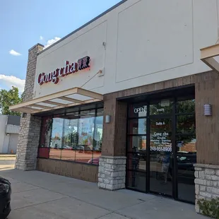 Outside. Next to battery plus