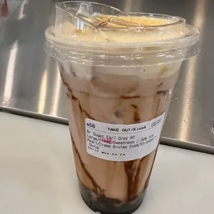 Brown  sugar Earl Grey strawberryMilk Tea top with creme brulé.