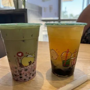 Strawberry Matcha w/boba (left)  QQ Passion Fruit Green Tea (right)