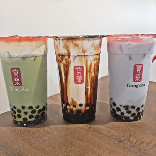 Creme brulee matcha milk foam tea, brown sugar cloud, and taro milk tea
