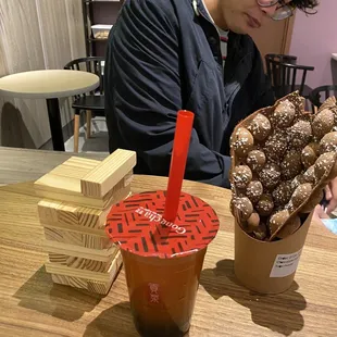 Cold Peach Lychee Fruit Drink wa boba, Chocolate Egg Waffle, &amp; games!