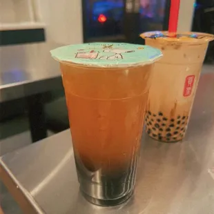 (Left) Lychee green tea w/ boba, (right) dirty brown sugar latte w/ boba.