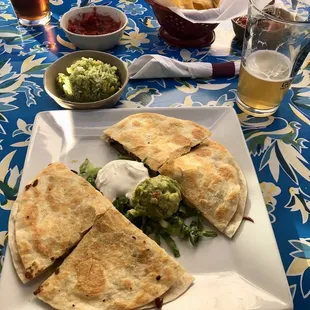 Steak quesadilla with cilantro rice side.