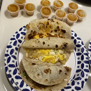 In this photo, chorizo w/egg, potato w/egg, barbacoa a-la-mexicana.