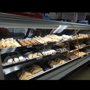 a display case of baked goods
