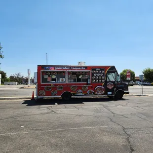 a food truck parked in a parking lot