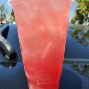 a drink in a plastic cup