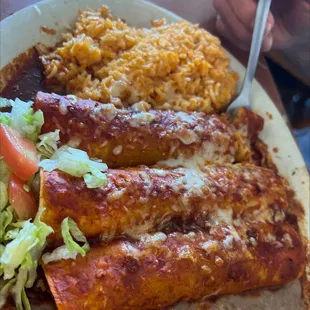 Meat enchiladas with red sauce