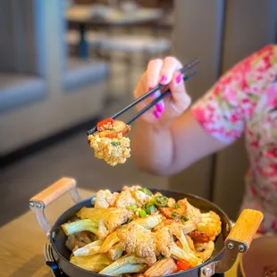 Cauliflower with pork belly in a Claypot