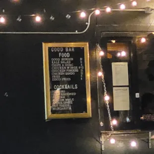 a menu on the wall of a restaurant