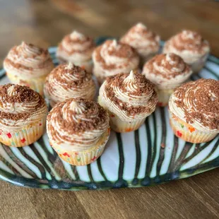 a plate of cupcakes