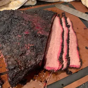 a bbq brisk on a cutting board