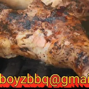 a chicken on a grill