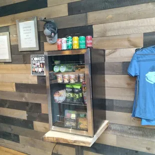 a display of beer and snacks