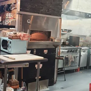 Kitchen with stone oven for Friday night pizza.