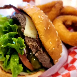 Texas burger with bacon and onion rings.