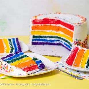 a slice of rainbow cake